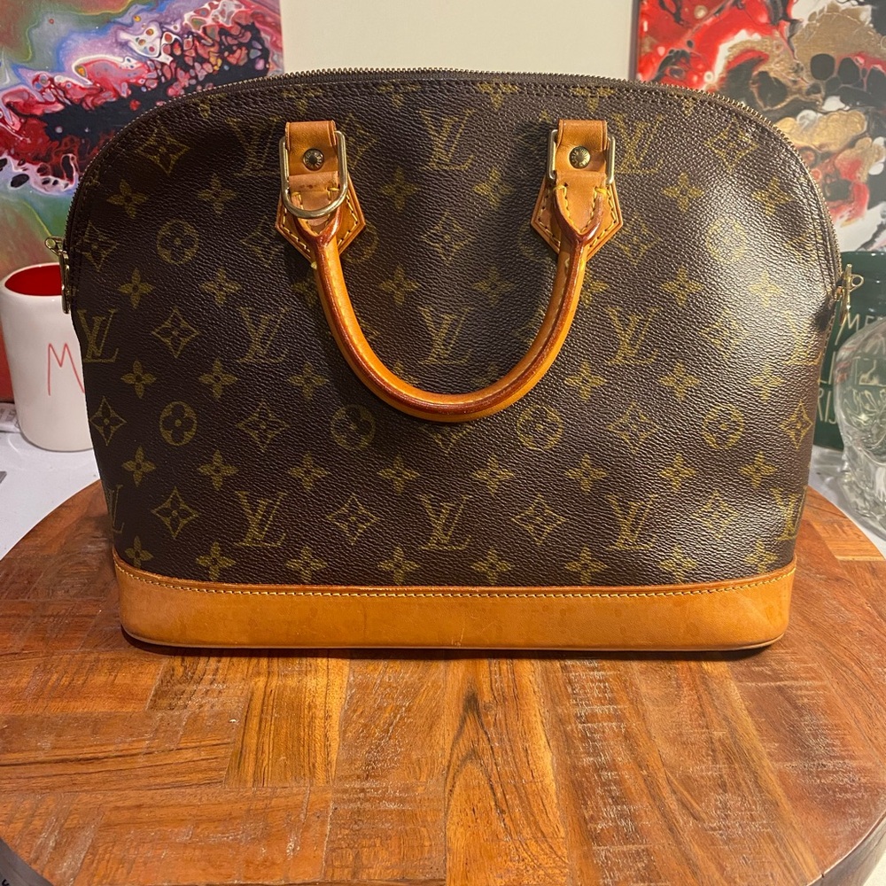 Louis Vuitton Alma Brown Monogram Handbag